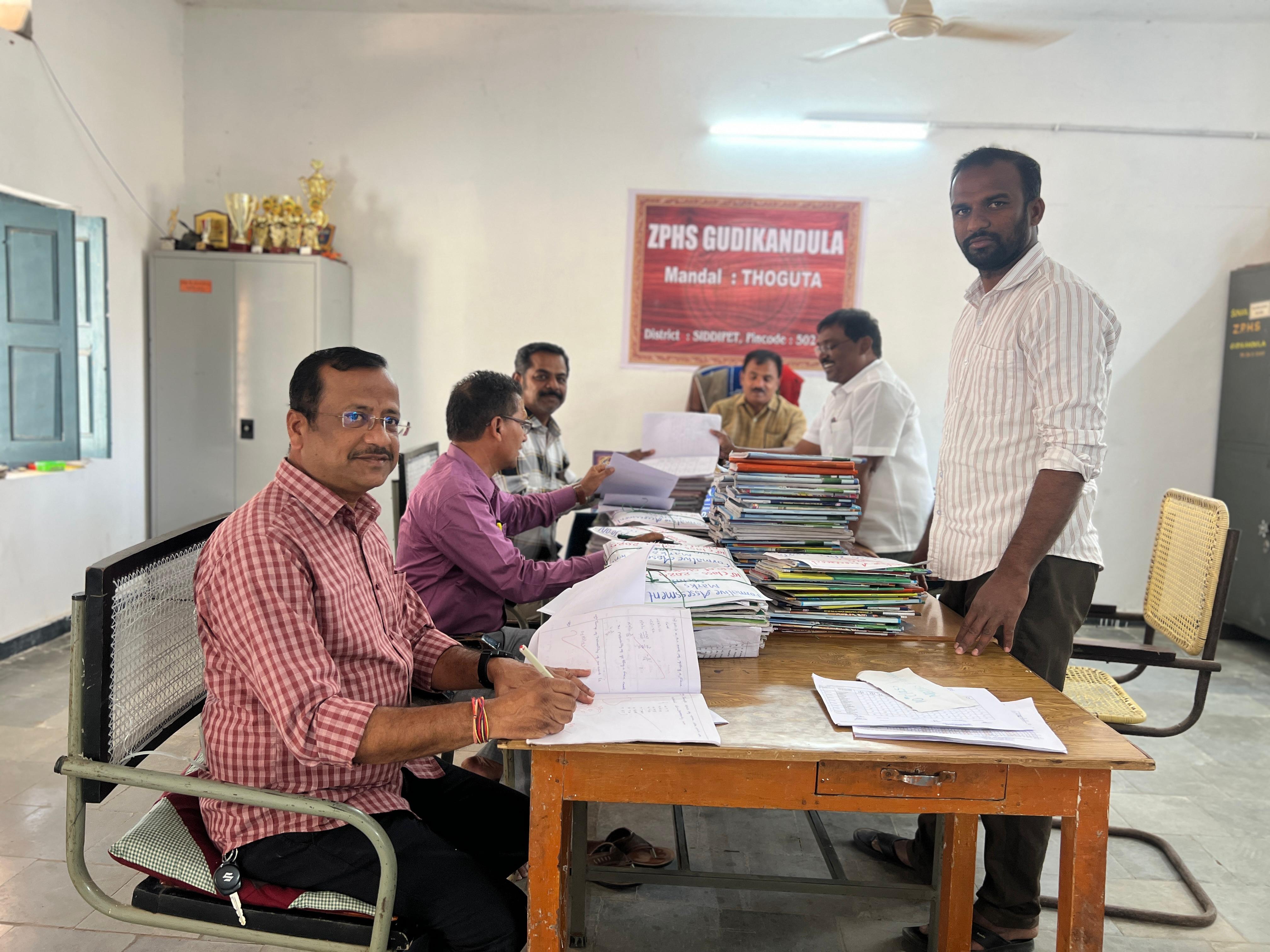 Teacher interacting with students
